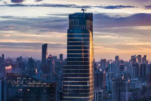 An urban cityscape at dusk.