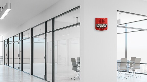 Fire detection alarm mounted on the wall