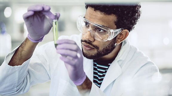 a research person holding test tube