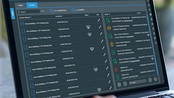 Man working on a desktop displaying Cloud Video Surveillance