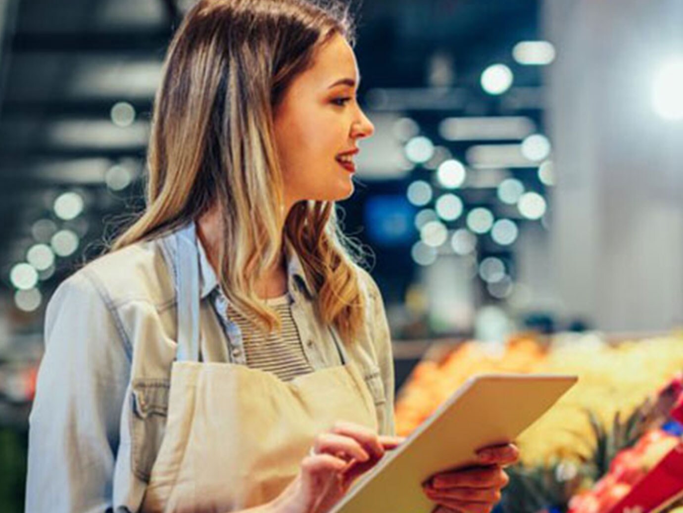 Woman working at a grocery store