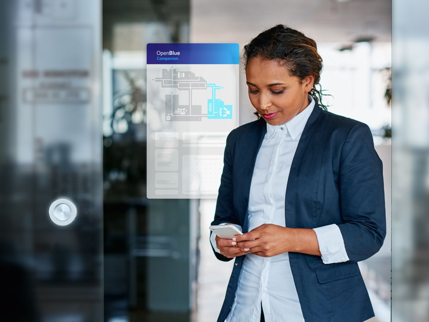 Lady looking at mobile and smiling