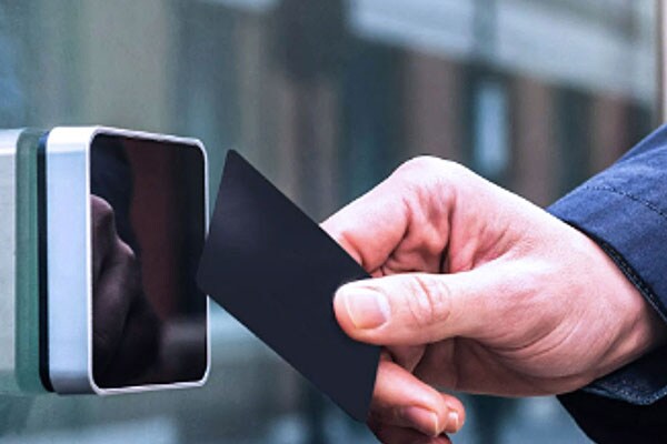 A hand holding a card