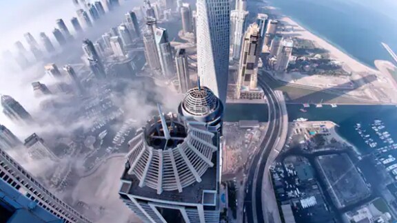Two video surveillance cameras on the exteriors of a building